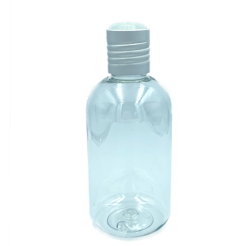 Botella pet transparente con tapa press plateada